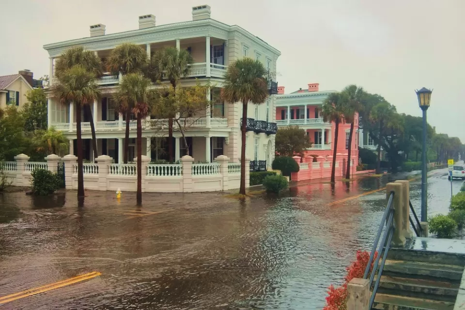 Flooded street with historic home in Charleston, South Carolina